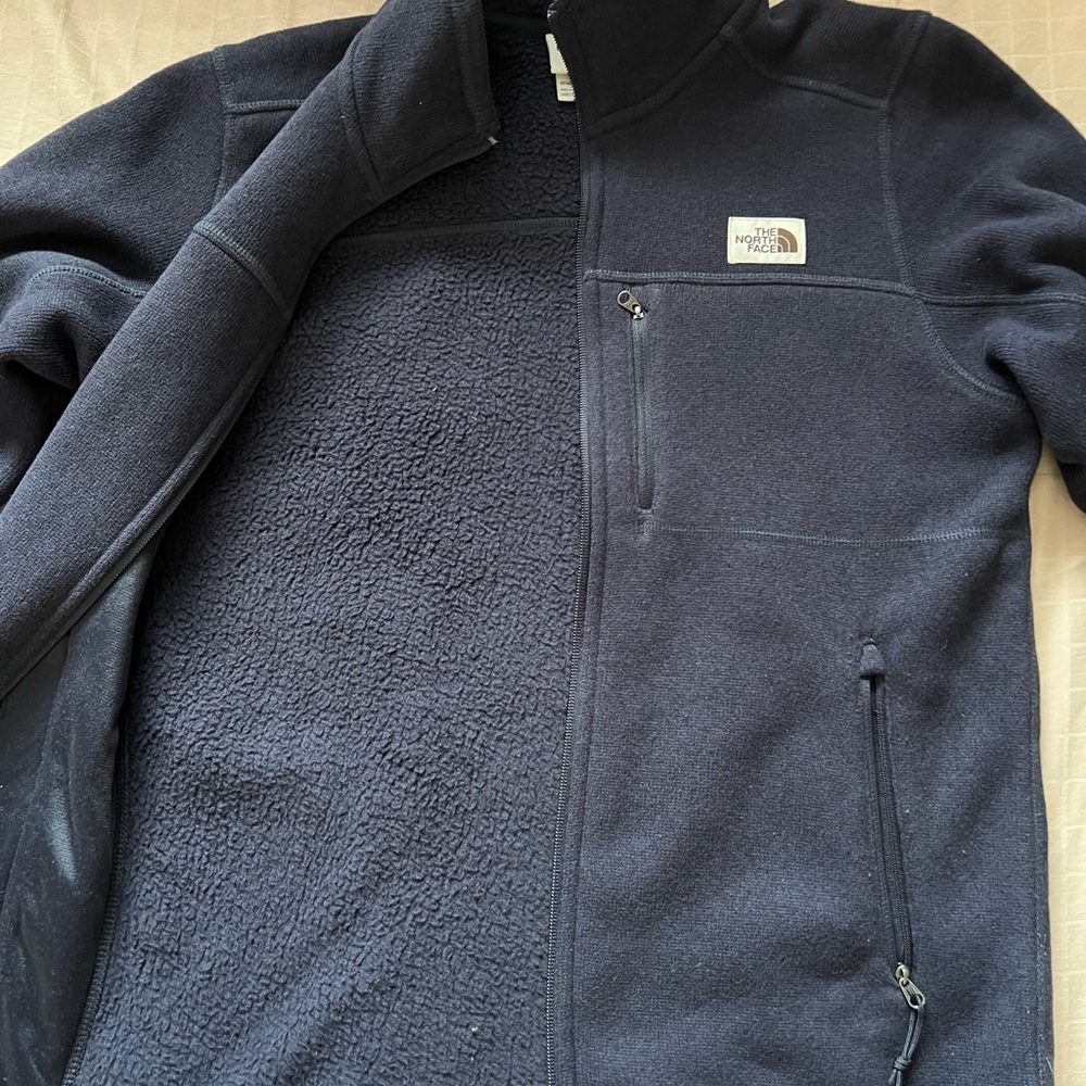 The North Face fleece jacket. Black with classic NF logo & nubby fleece inside.